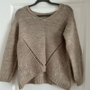 V-neck knit sweater.